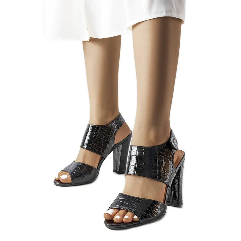 Black patent leather sandals from Hesasne