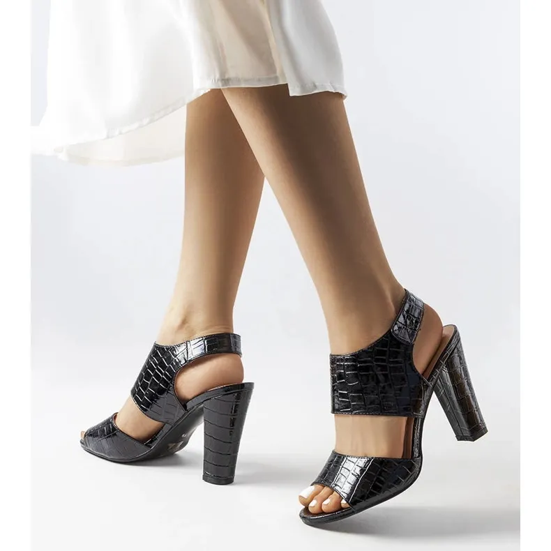 Black patent leather sandals from Hesasne