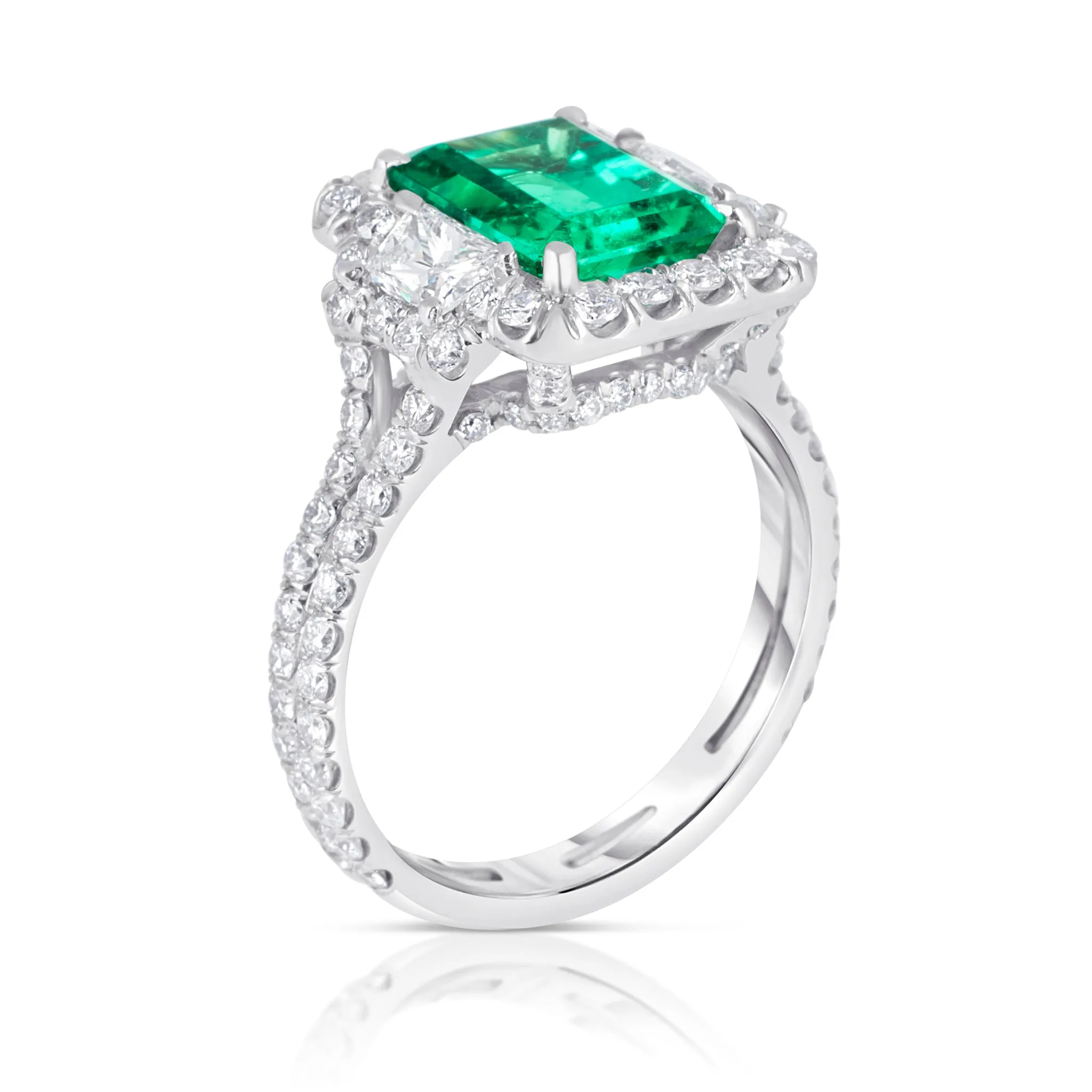 Platinum Emerald Ring with Trapezoid Diamonds and Diamond Halo