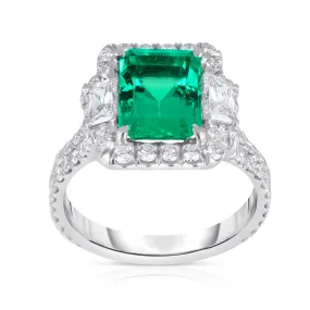 Platinum Emerald Ring with Trapezoid Diamonds and Diamond Halo