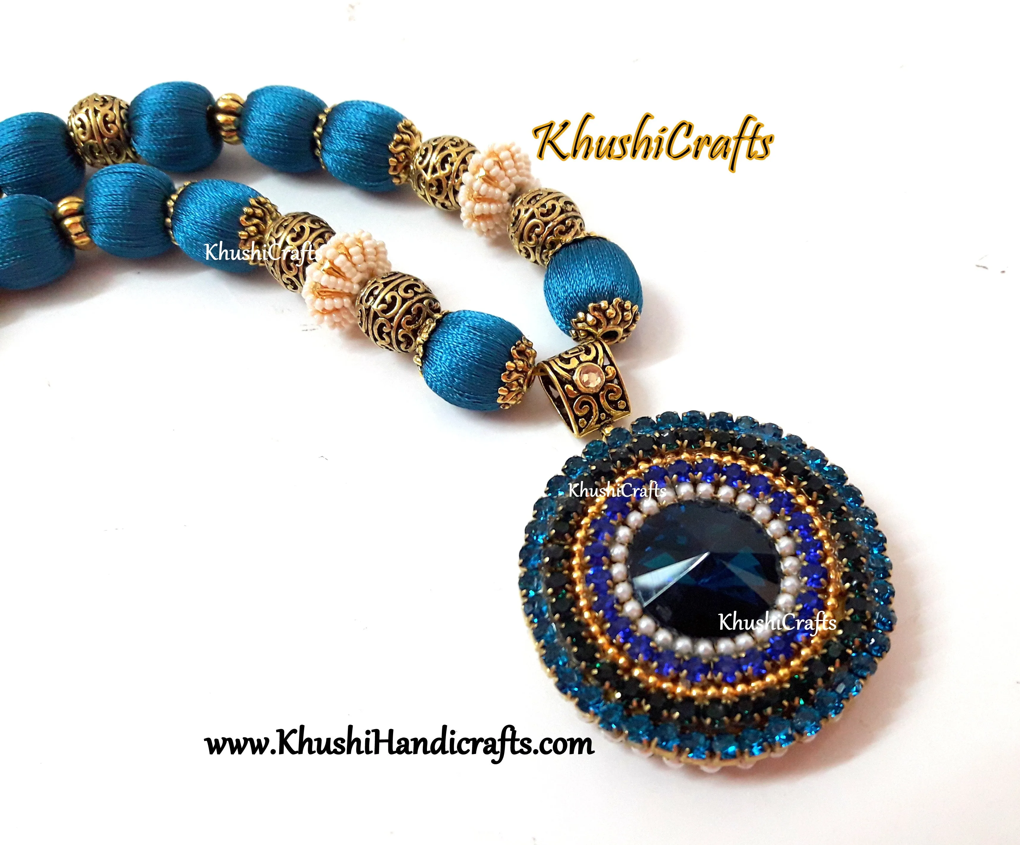 Silk Thread Jewellery set in Peacock Blue shade with a handcrafted Rivoli Glass crystal pendant!