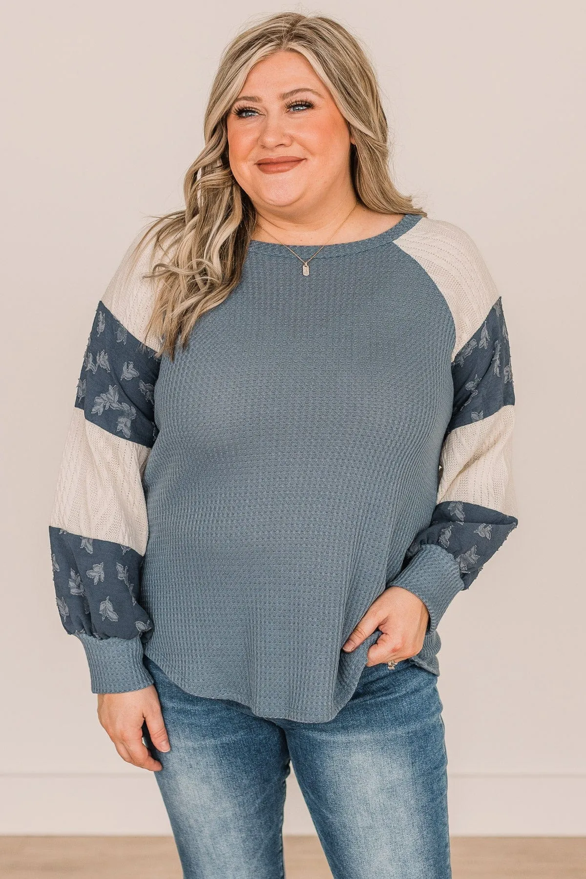 Striped Teal Knit Top - Speaking Volumes