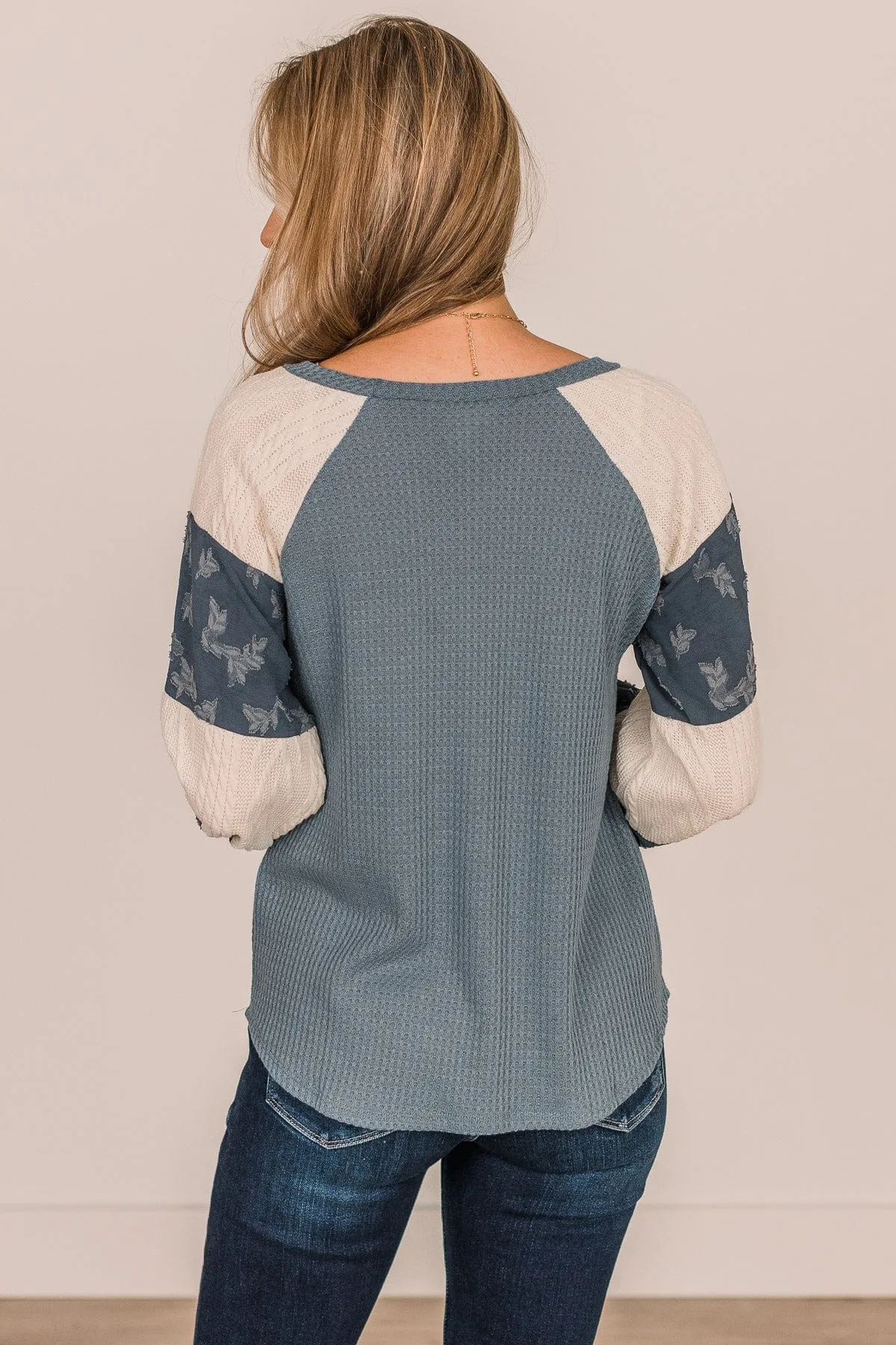 Striped Teal Knit Top - Speaking Volumes