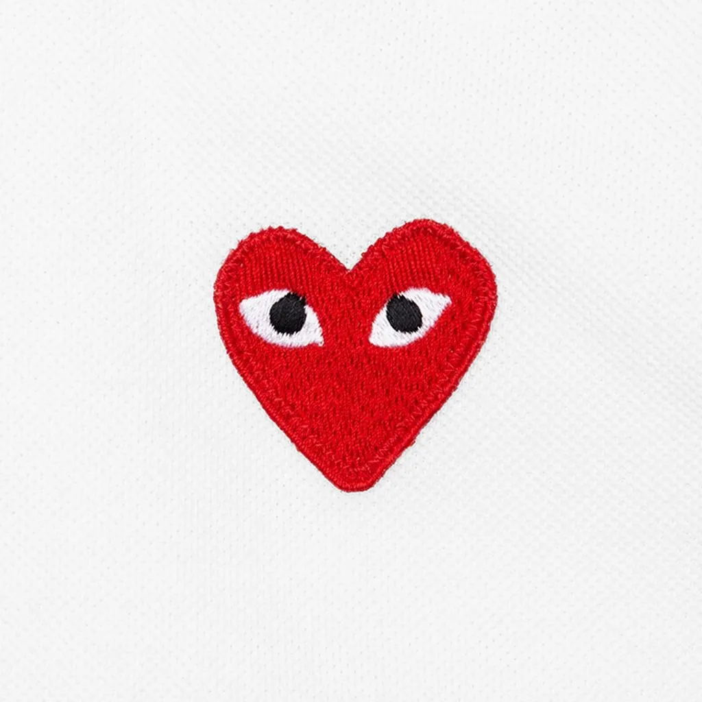 White Women's Polo Shirt with Red Heart